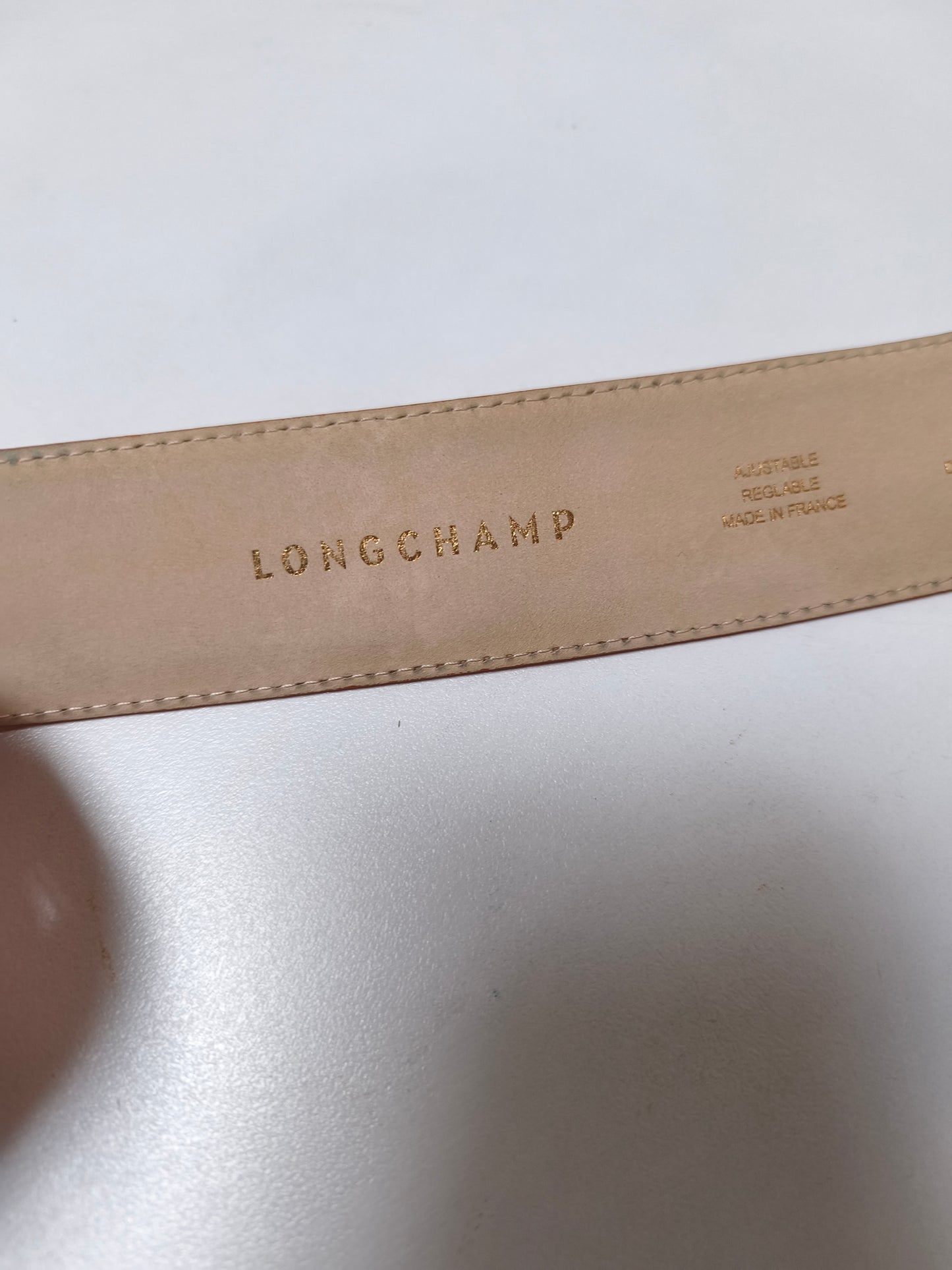 Longchamp riem oranje