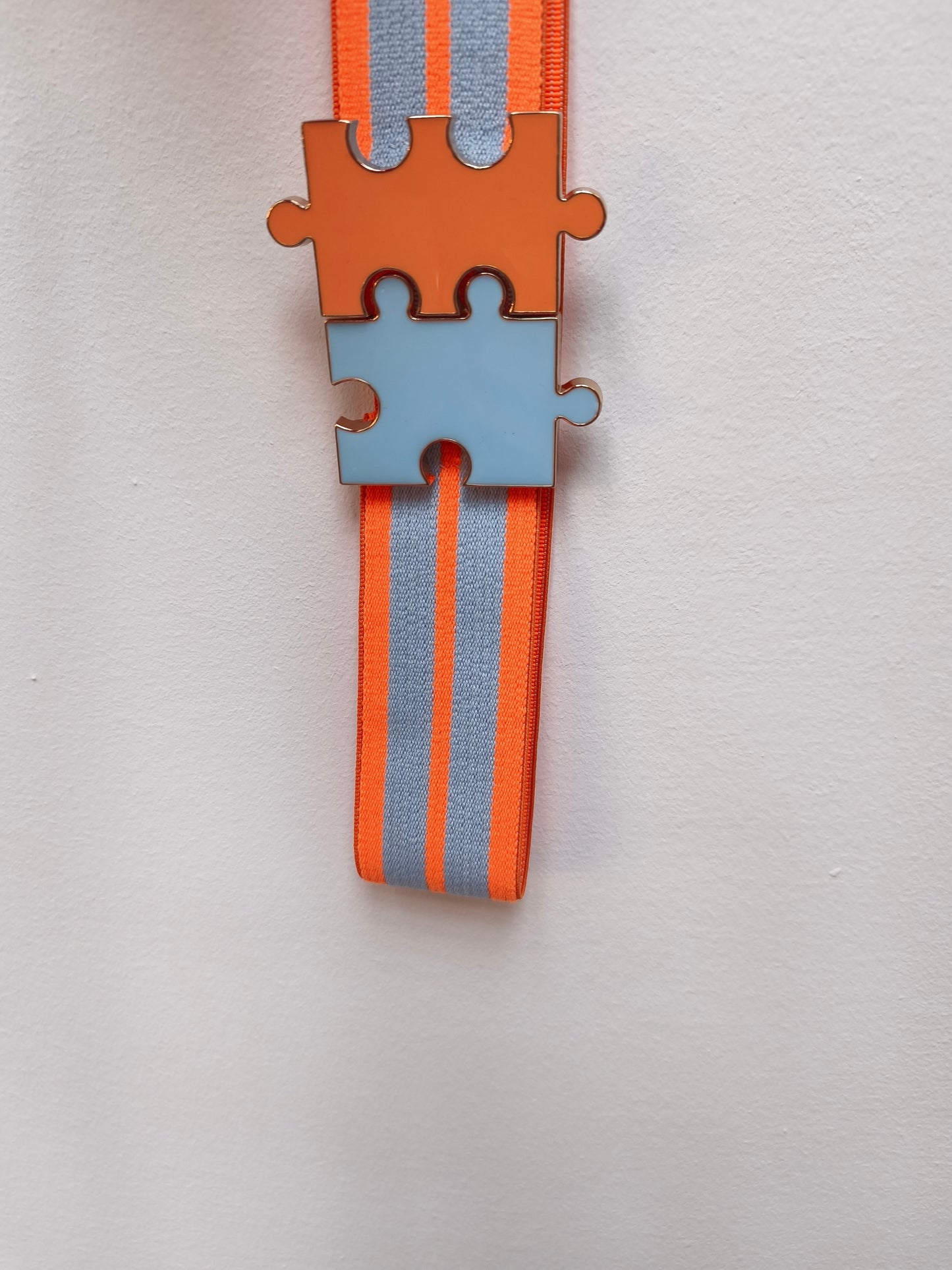 Essentiel riem puzzel blauw/oranje
