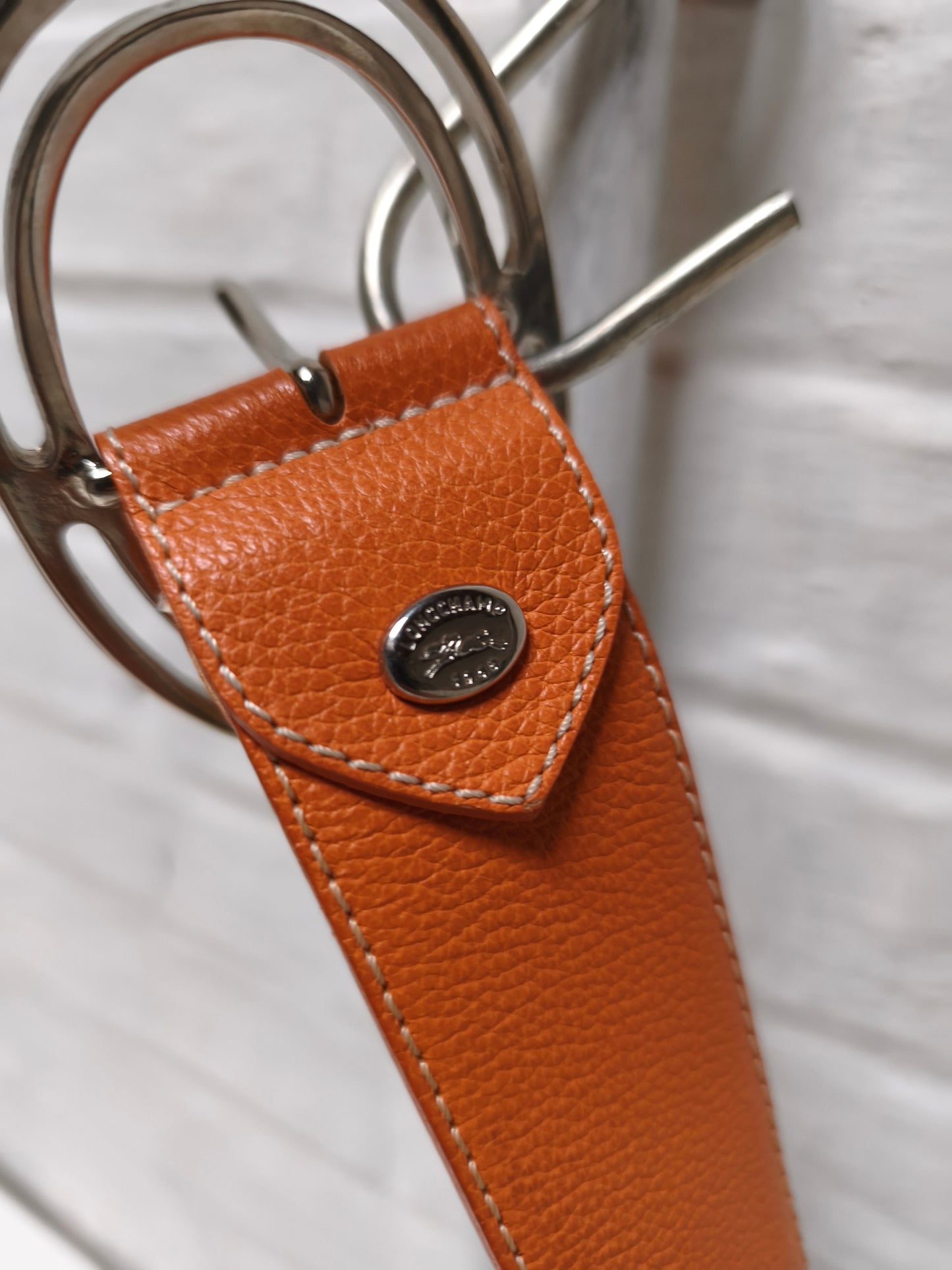Longchamp riem oranje